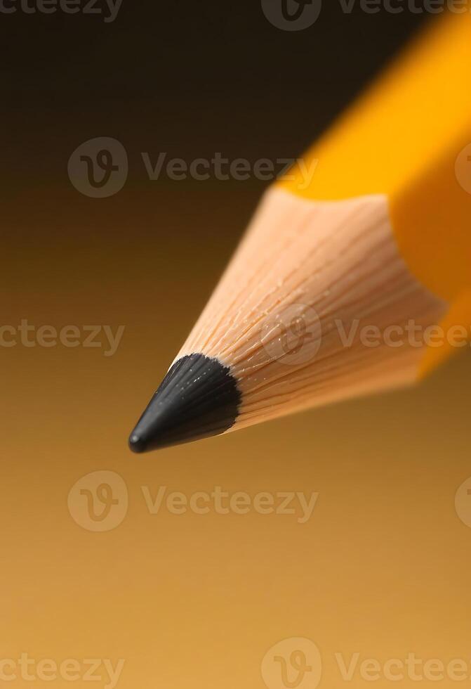 close up of a pencil with a brown background photo
