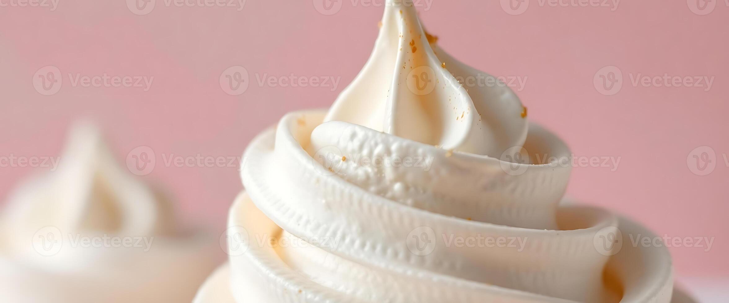 close up of a cupcake with whipped cream on top photo