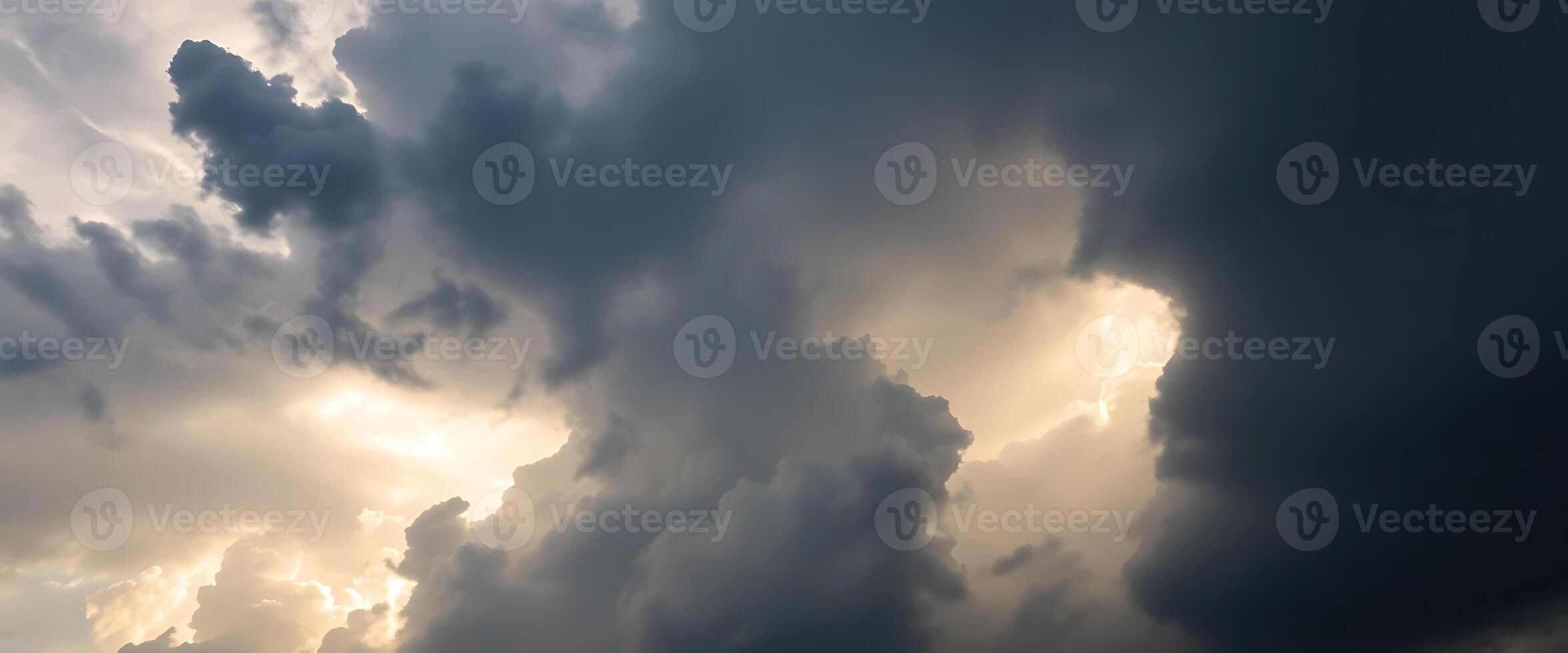 plane flying through a cloudy sky on a sunny day photo