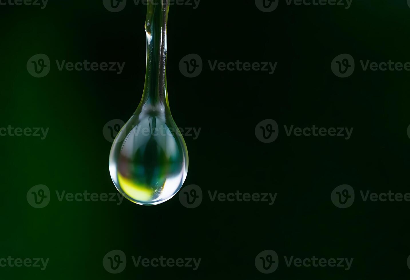 drop of water hanging from a pipe photo