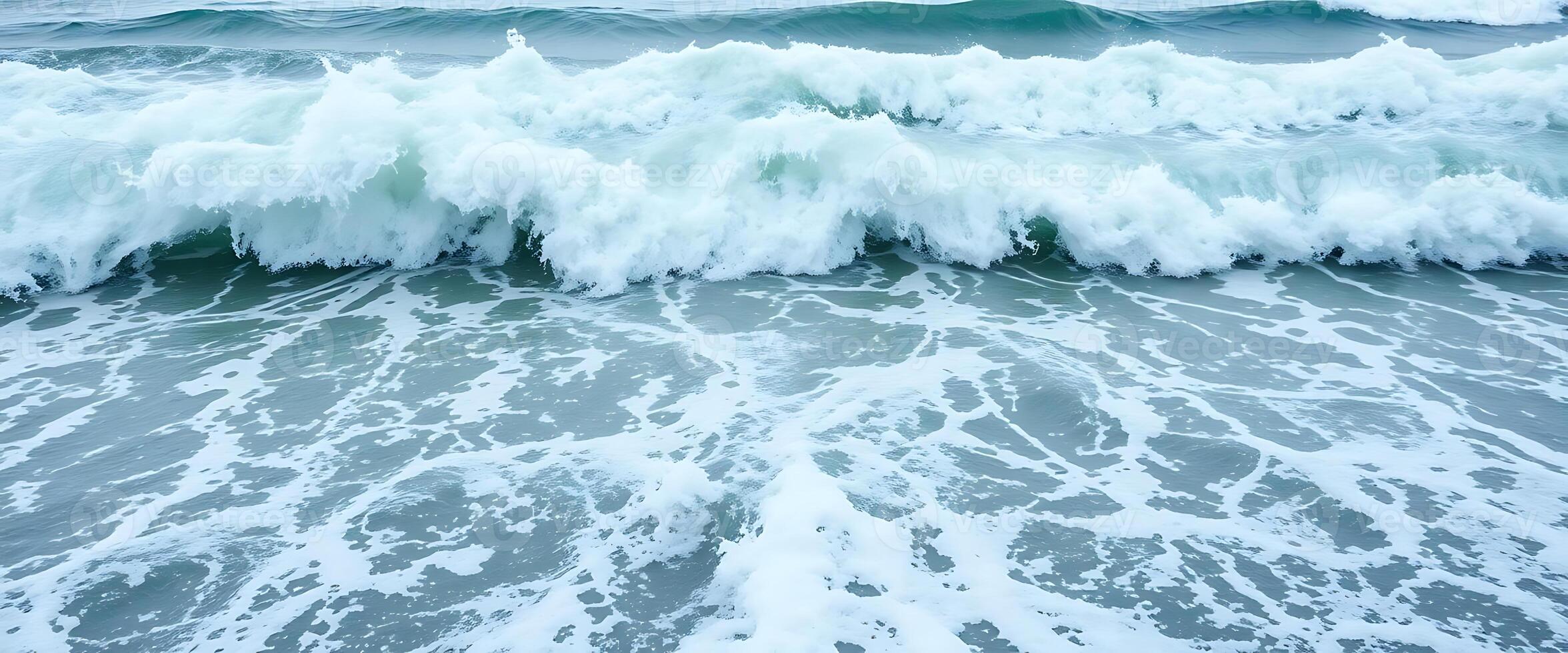 large wave is breaking over the ocean photo