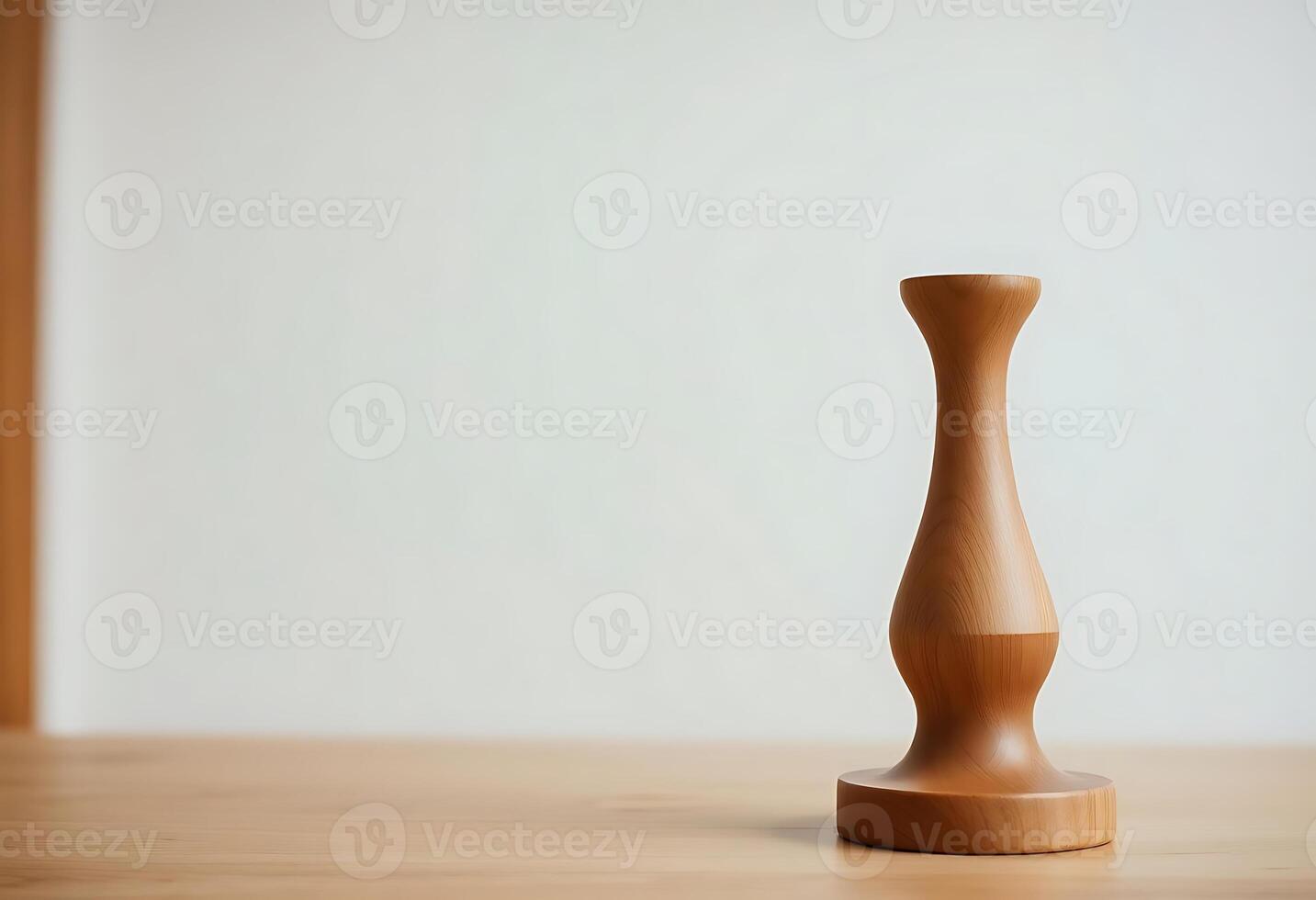 wooden object sitting on top of a wooden table photo