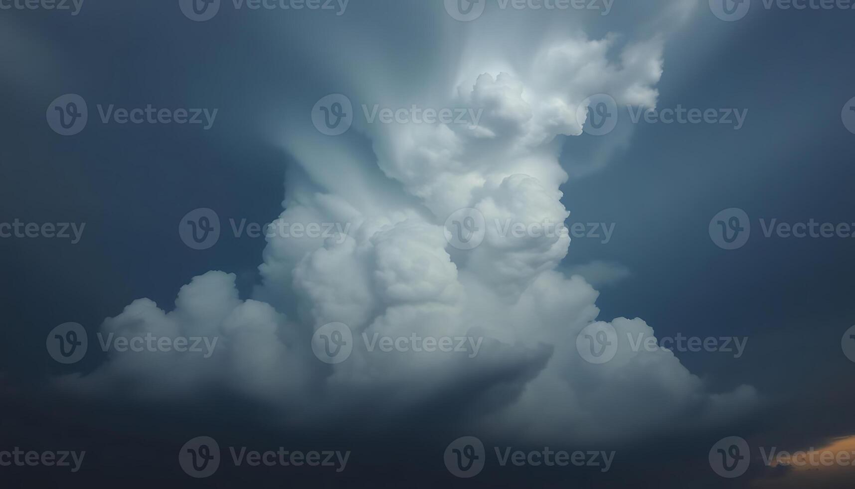 very large cloud in the sky with some clouds in the background photo