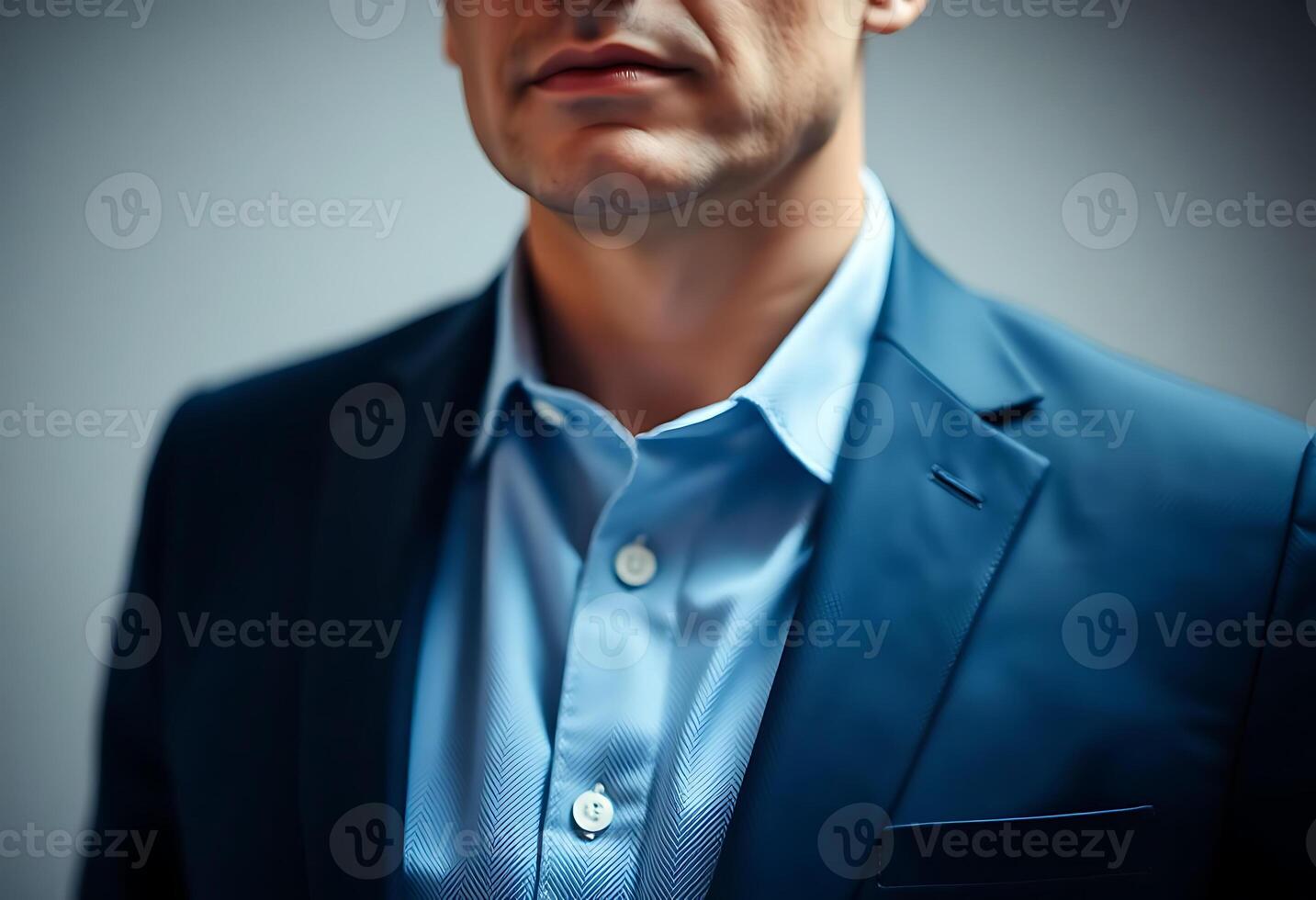 man wearing a blue suit and a blue shirt photo