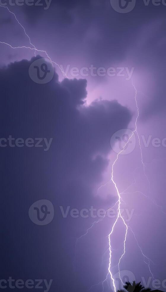 purple sky with a lightning bolt in the middle of it photo