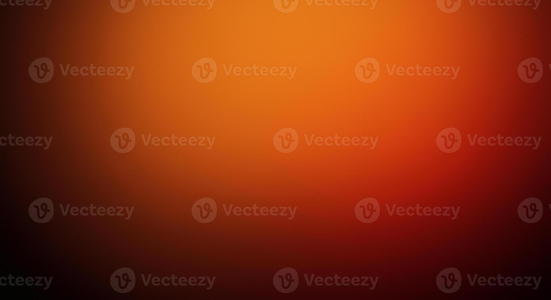 An orange and black background with a blurry image photo