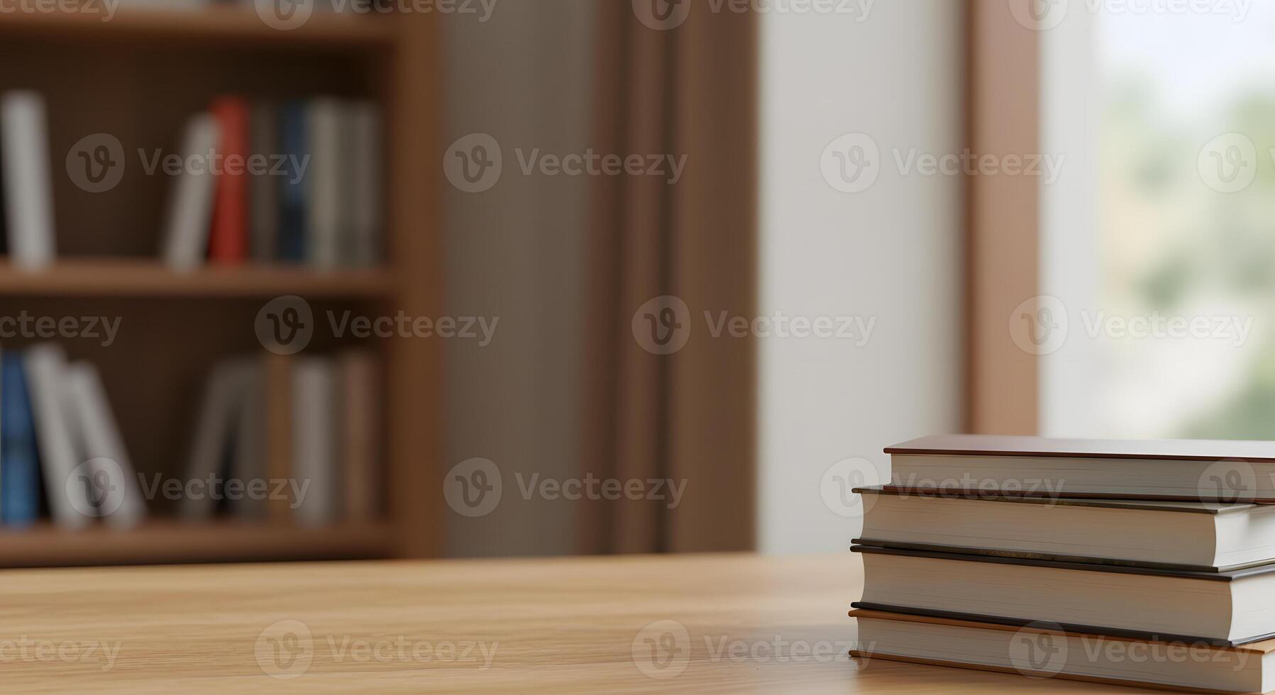 A stack of books on a table in front of a window photo