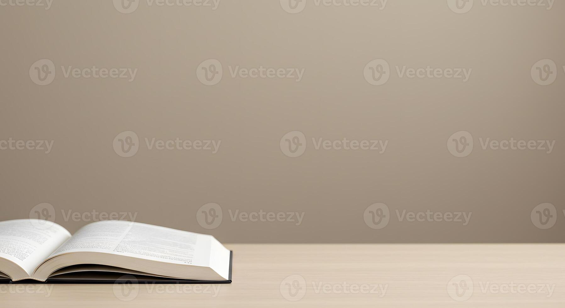 Open book on wooden table with copy space photo