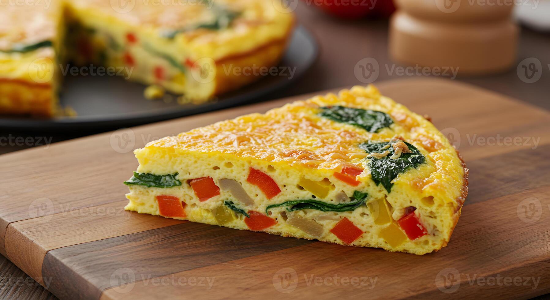 A quiche with vegetables on a cutting board photo