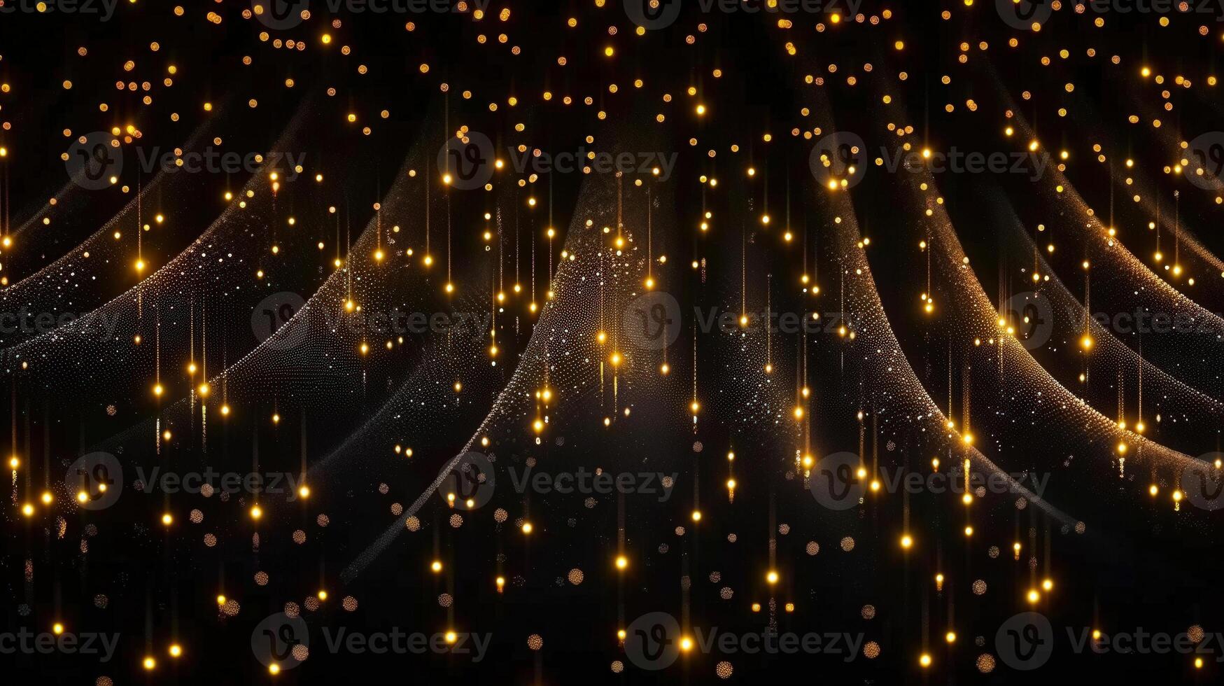 Elegant golden light curtains flow gracefully, with sparkling particles suspended against a black backdrop. photo