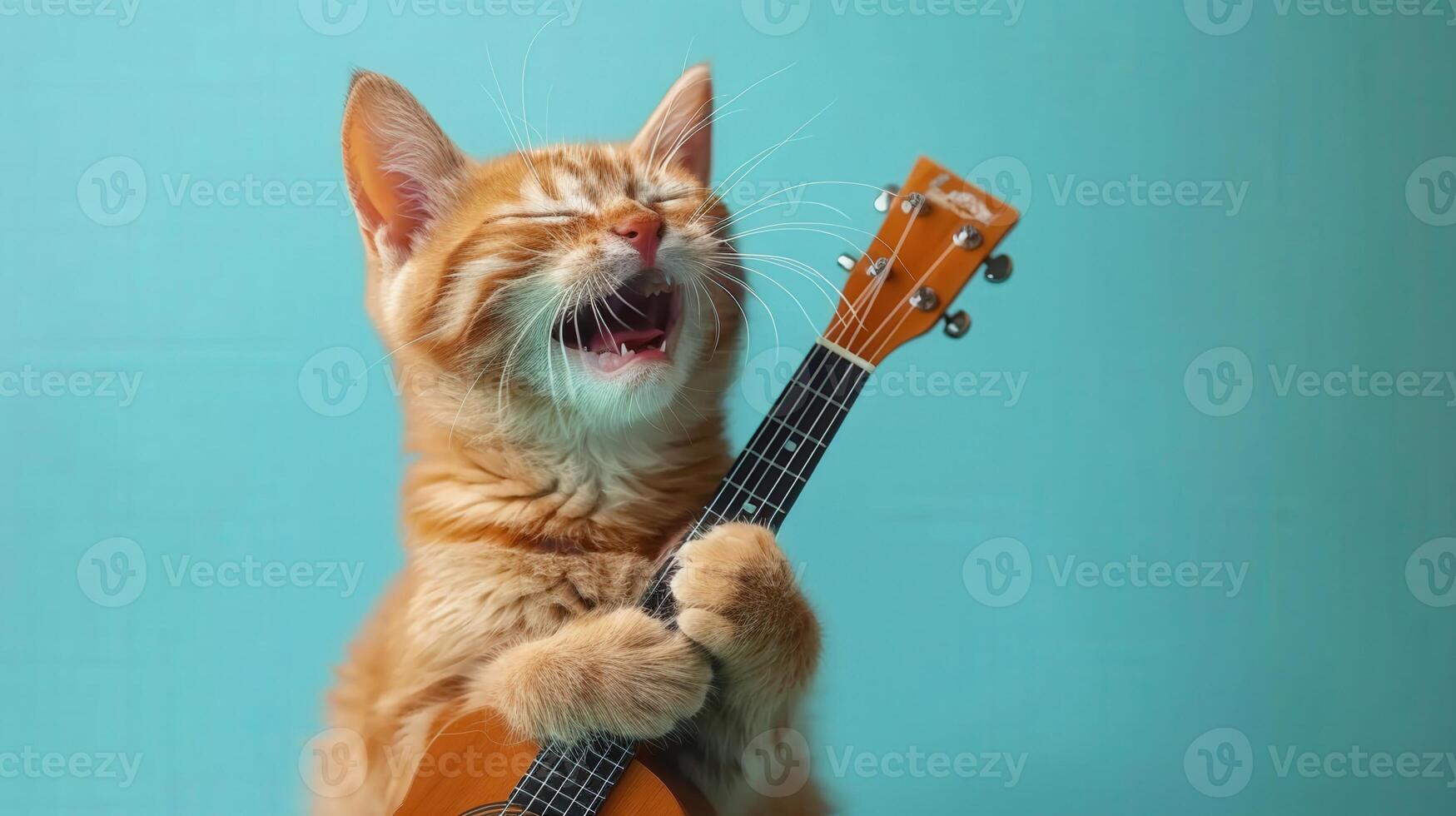 A delightful ginger kitten serenades with a ukulele, creating a joyful musical moment. photo