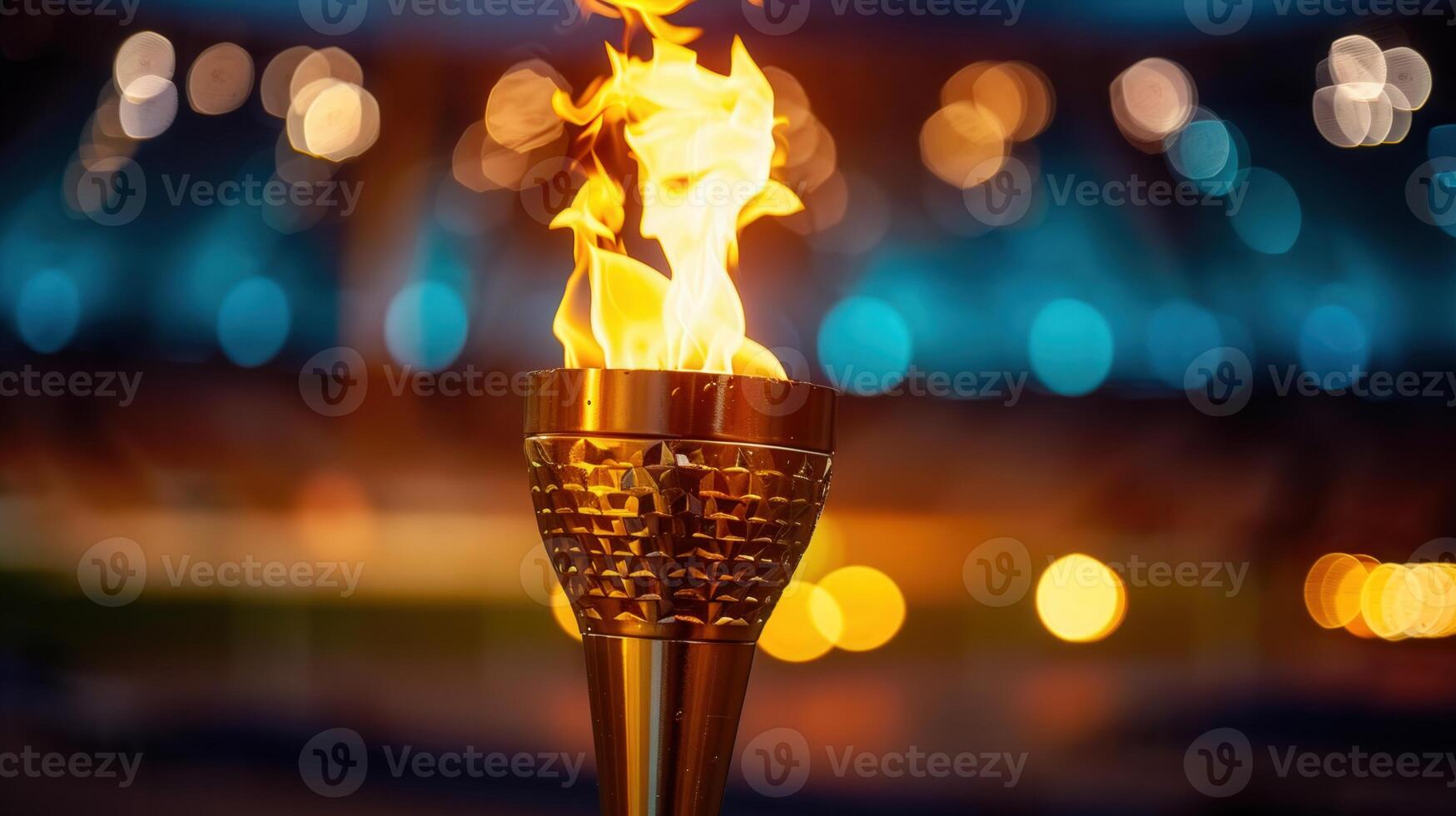 The Olympic torch burns brightly, symbolizing the spirit of competition and unity in the stadium. photo