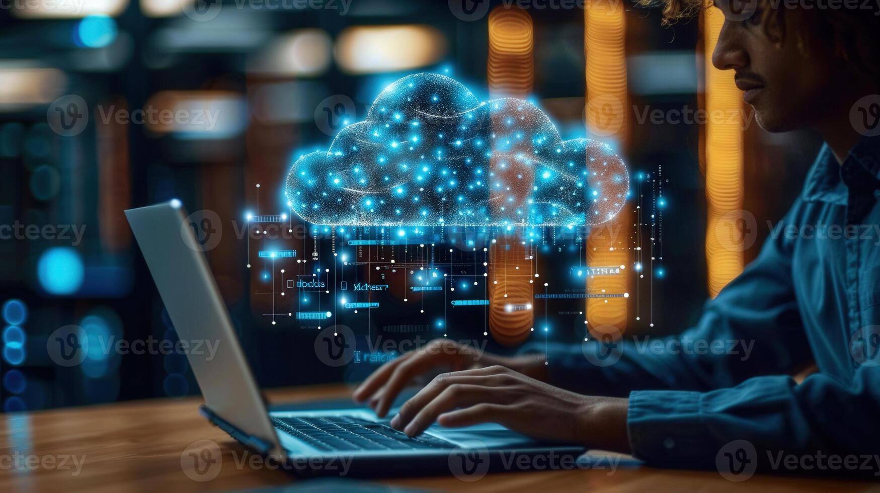 A man working on a laptop with a vibrant cloud computing graphic overlayed, creating an abstract scene. photo