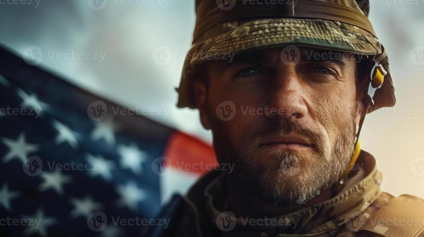 A determined soldier stands with the American flag, a symbol of national pride and service. photo
