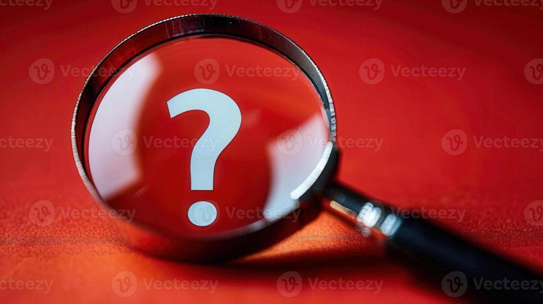 A magnifying glass focuses on a large question mark against a striking red backdrop, asking why photo