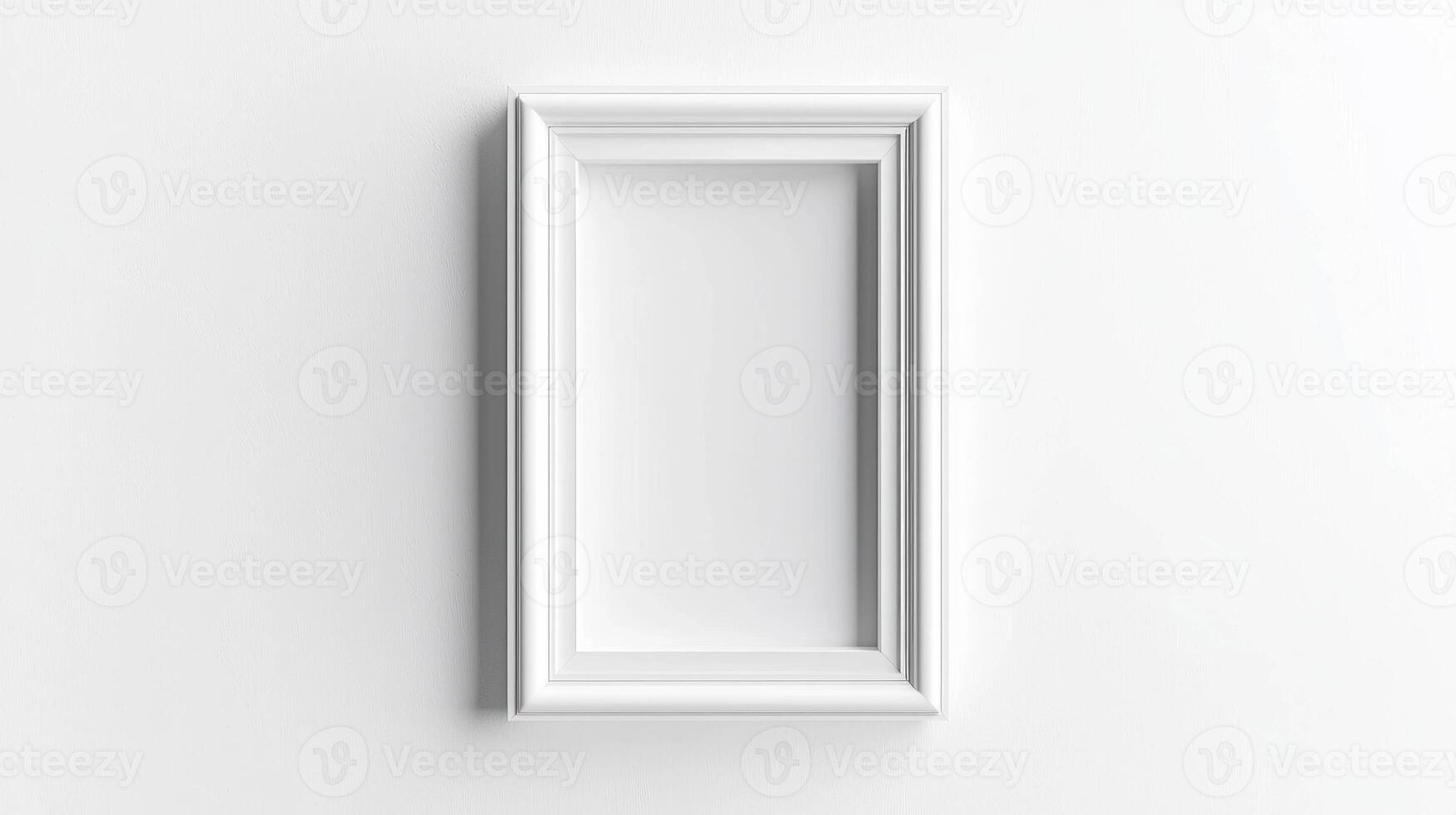 Minimalist white empty rectangular frame on white wall for interior design or art display photo