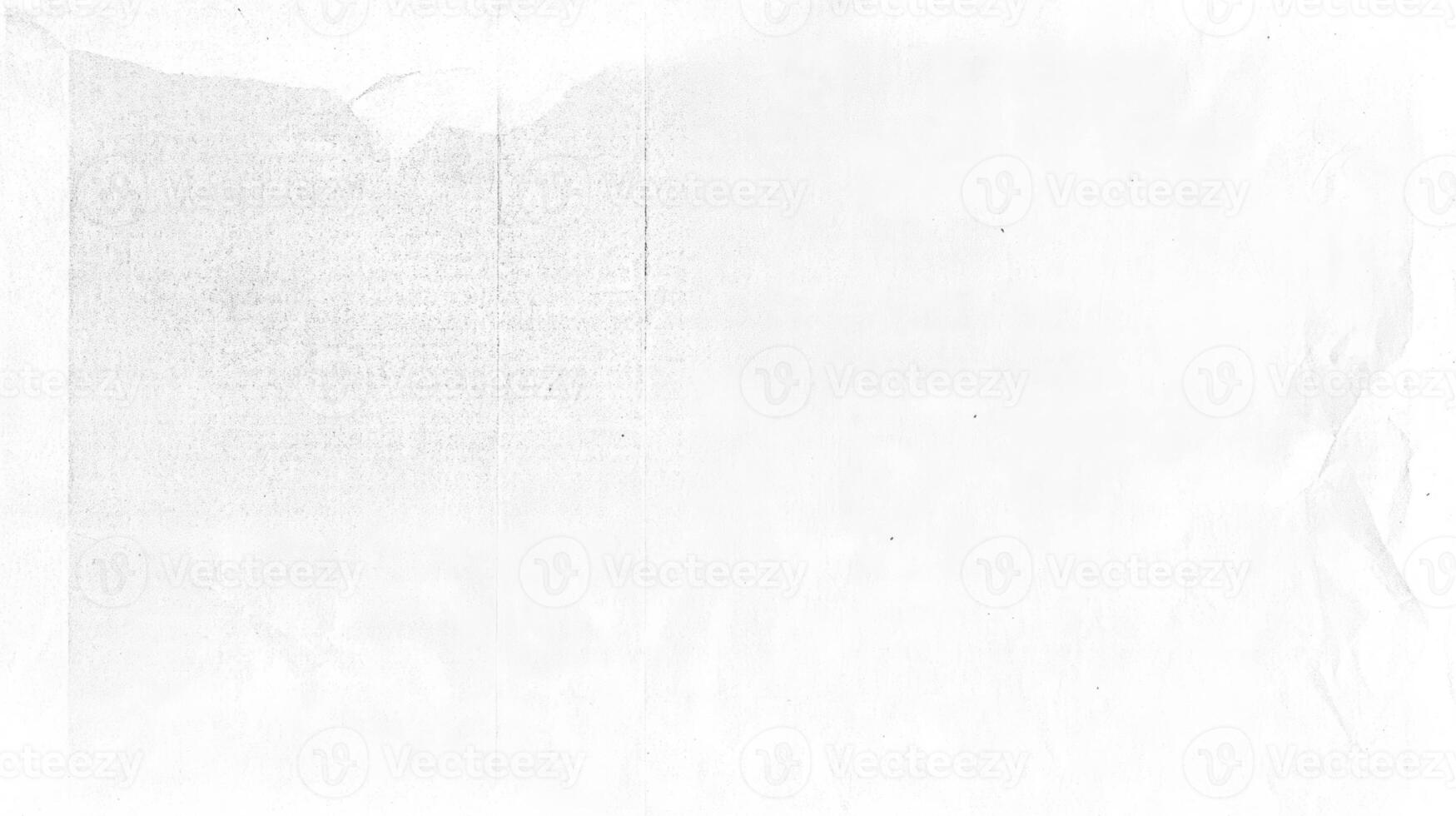 Vintage distressed texture of worn and crumpled old paper in black and white photo