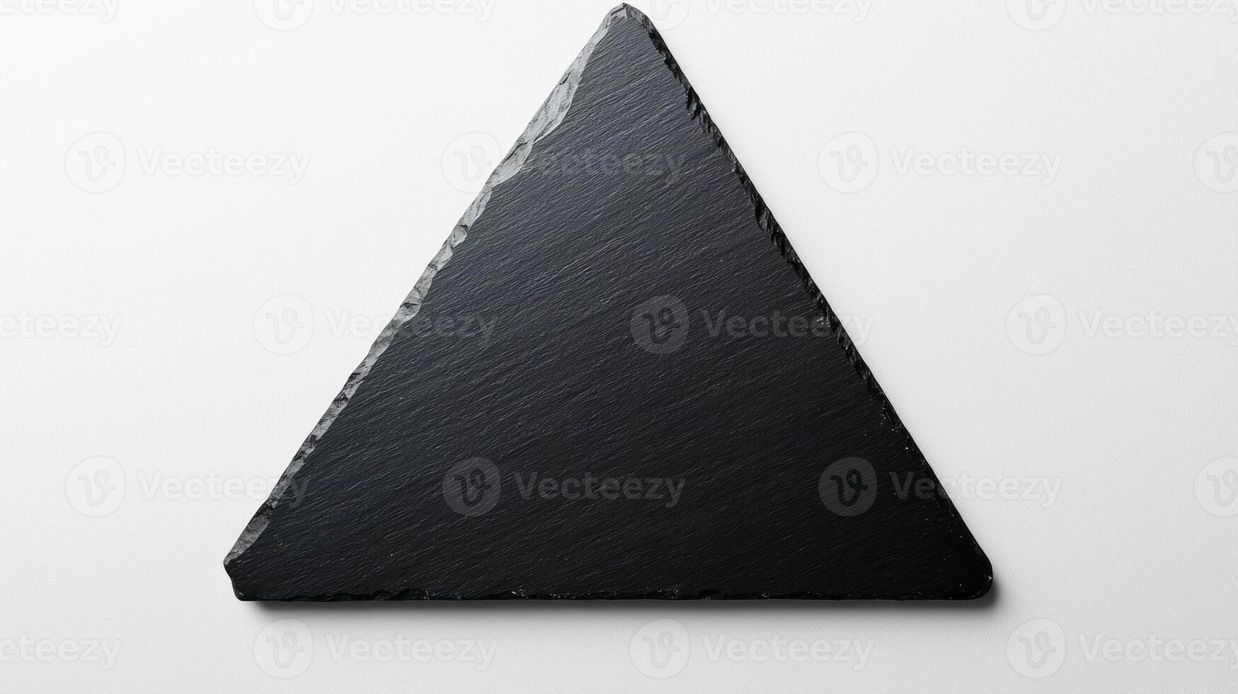 Modern minimalist triangular slate serving platter for elegant table settings photo