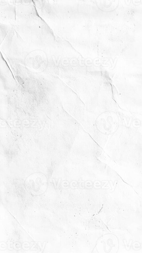 Vintage worn and crumpled paper texture in black and white for creative design photo
