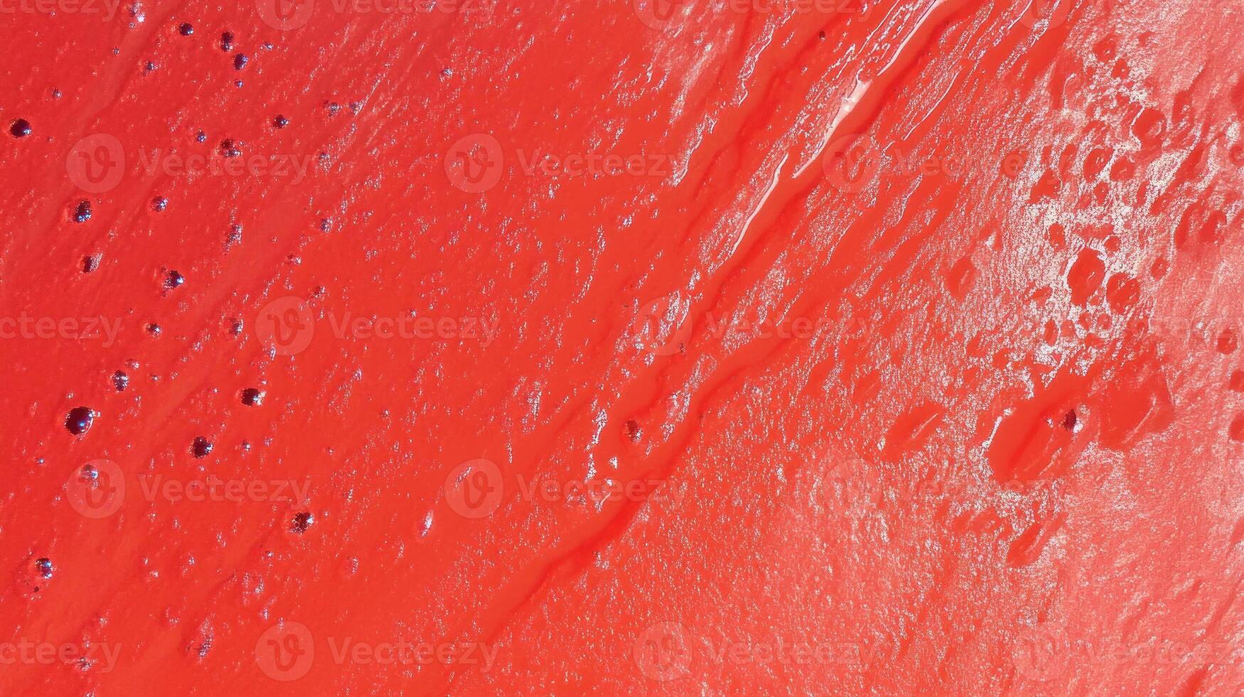 Abstract red texture with chaotic patterns inspired by the moon, suitable for creative design projects photo