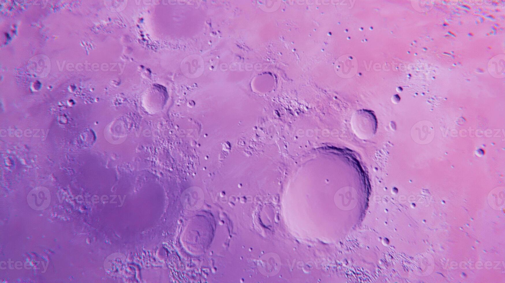 Mysterious violet moon surface with craters and texture for creative design photo