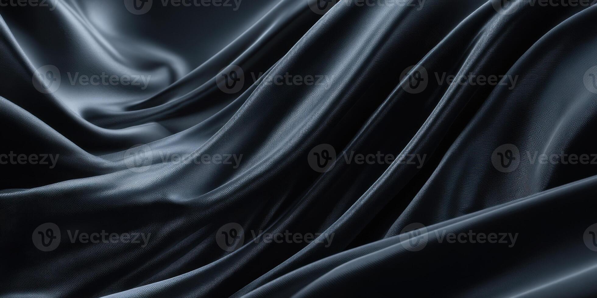 Black silk fabric with folds and folds photo