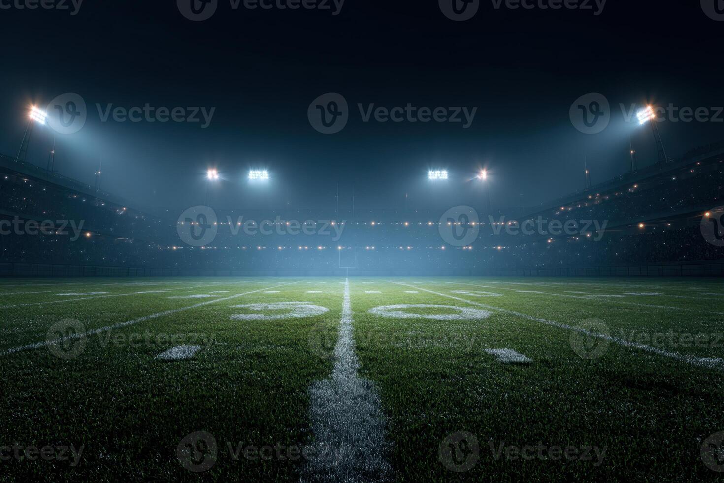 An empty football field at night photo