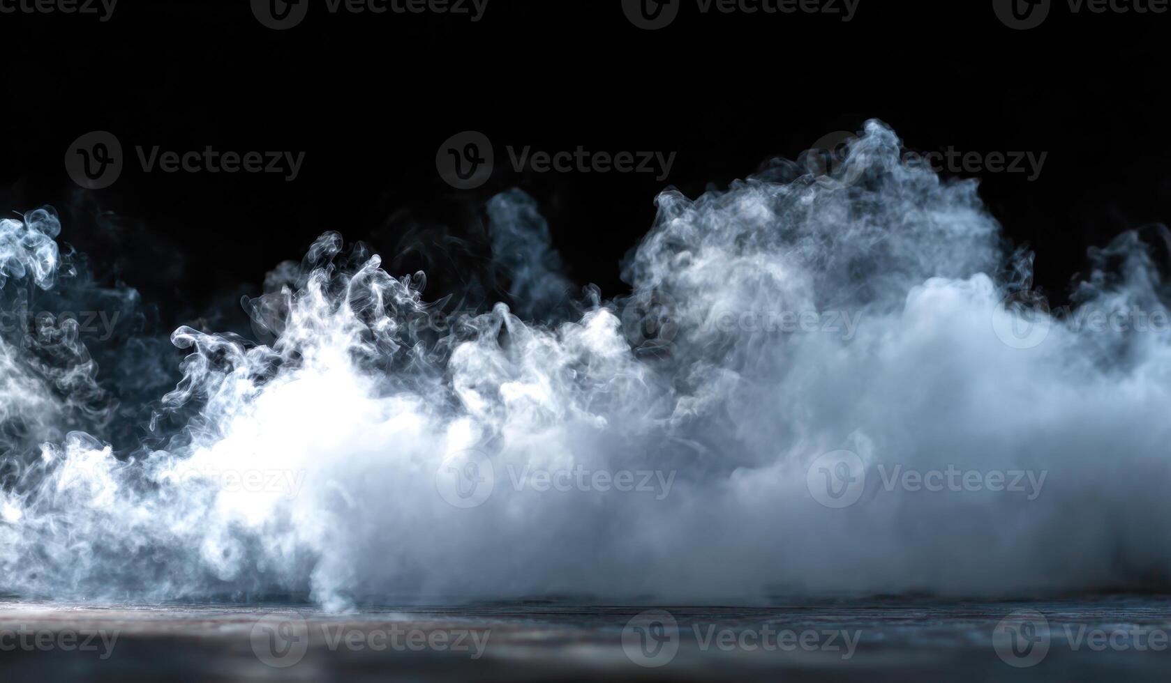 A large wave of water is coming out of the ocean photo