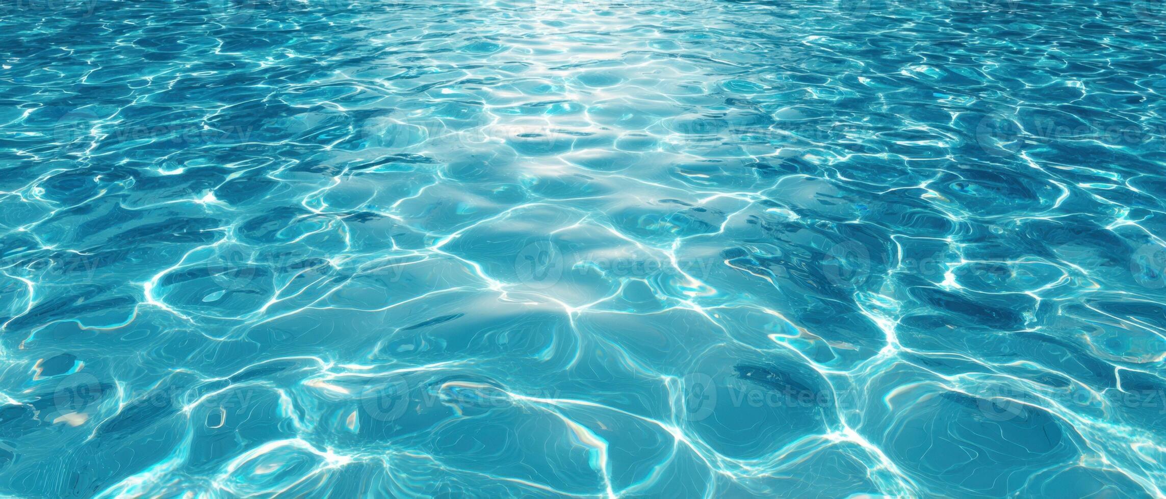 A pool with blue water and sunlight photo