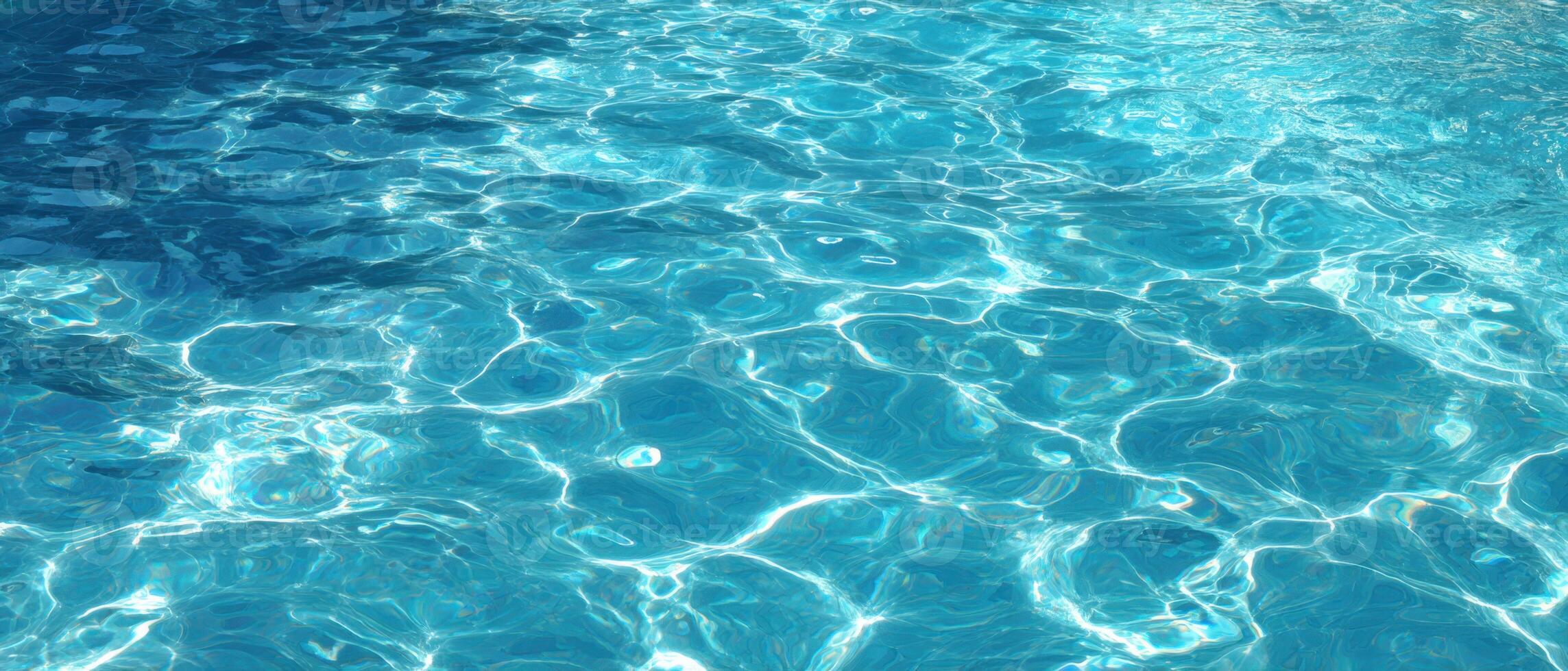 A pool with clear water and blue sky photo