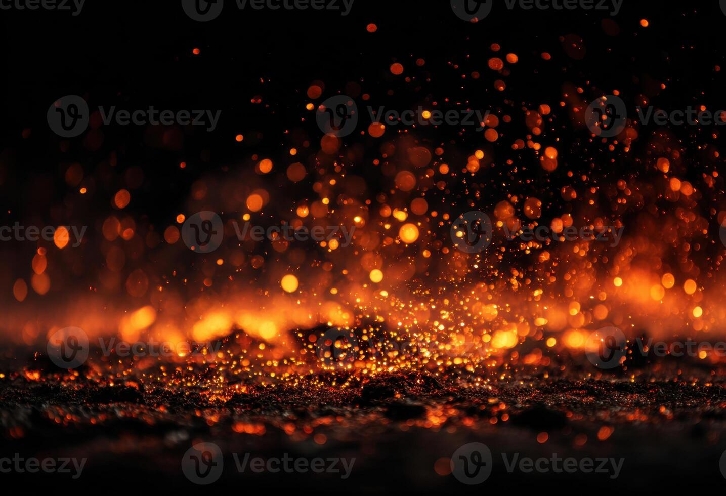 A close up of a fire with sparks and sparks photo