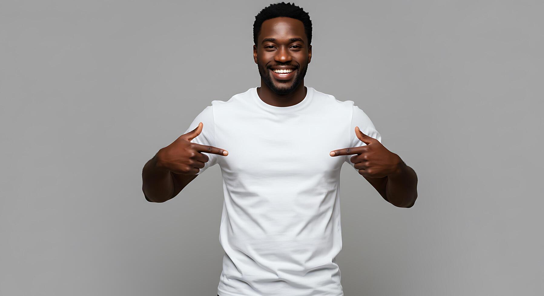 A man in a white t - shirt pointing at the camera photo