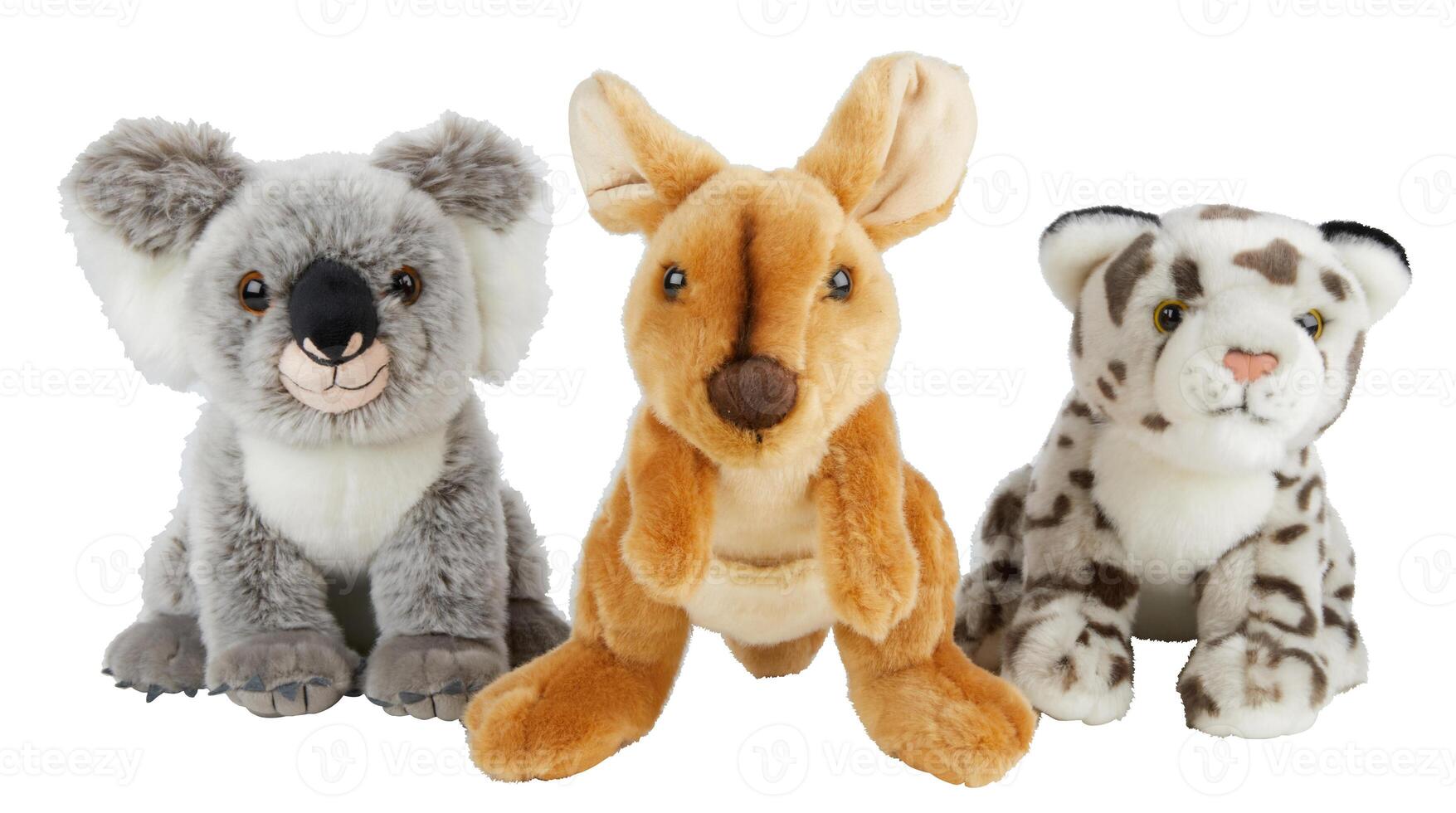 Koala, kangaroo and tiger dolls sitting on the ground cut out isolated white background with clipping path photo