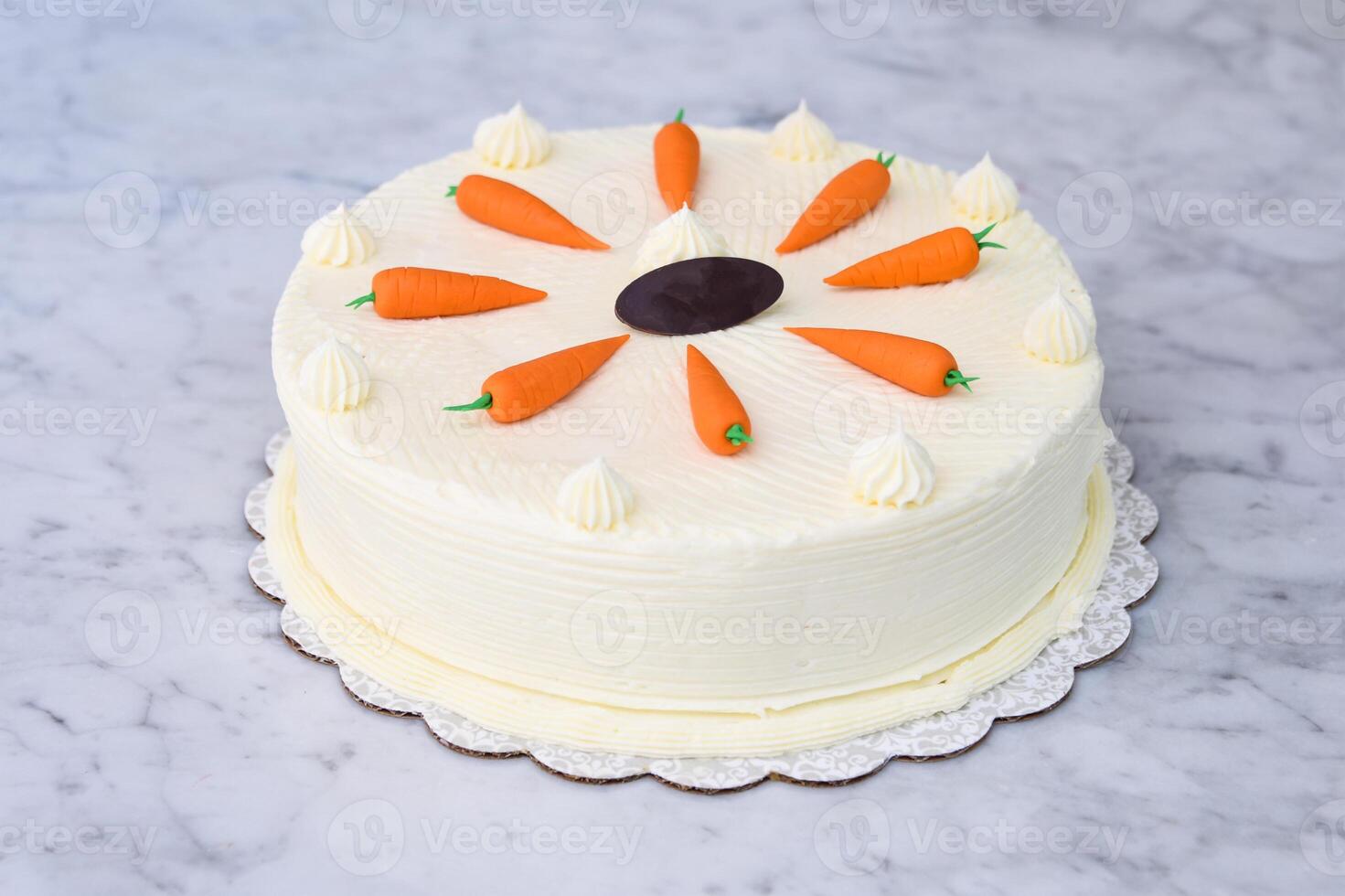 Decorated Carrot Cake, featuring moist and spiced cake layers covered in smooth cream cheese frosting side view of delicious cafe cake photo