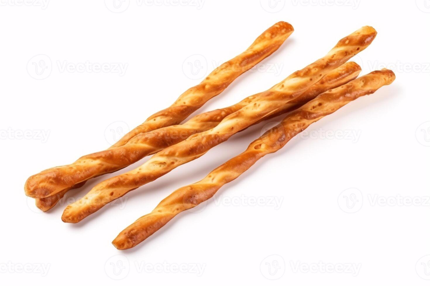 A dry, salty, crispy Grissini pretzel atop a white surface viewed from the top. photo