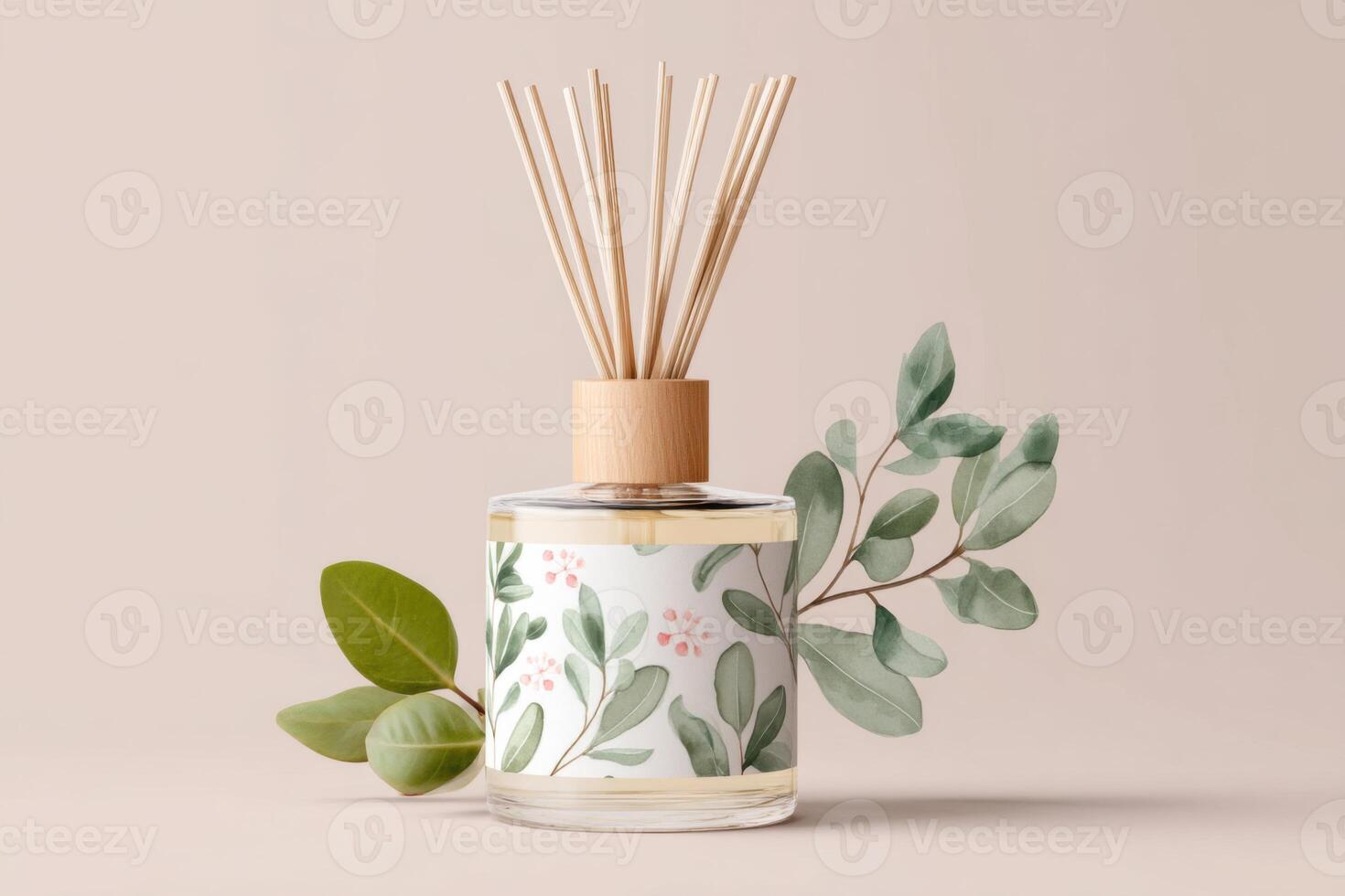 Decorative aroma diffuser with natural reeds and floral design, surrounded by green leaves, creating a calming atmosphere for home decor and relaxation photo