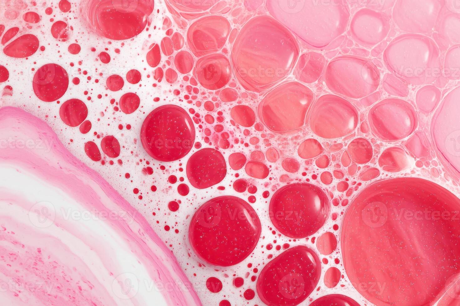 Macro shot of bubble texture forming a pink and vermillion abstract background photo