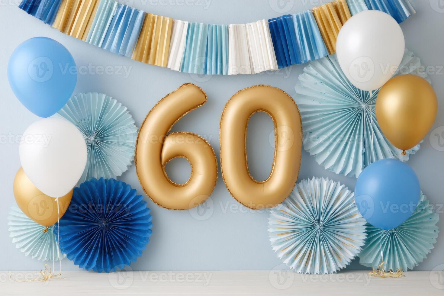 Golden number 60 balloons surrounded by blue and white decorations, paper fans, and colorful balloons, creating a festive atmosphere for a birthday celebration or anniversary event photo