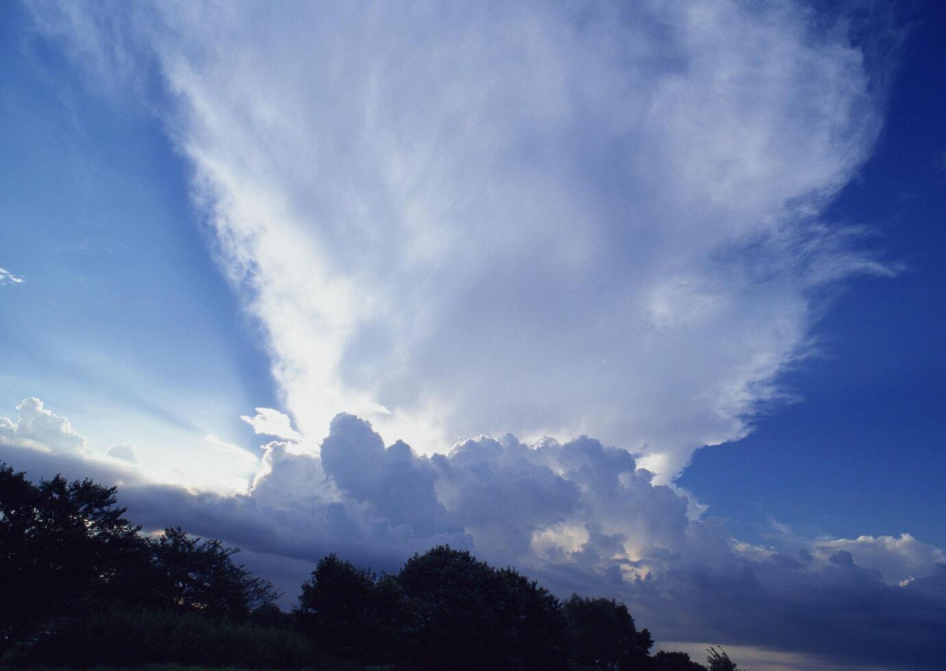 a large cloud is seen in the sky photo