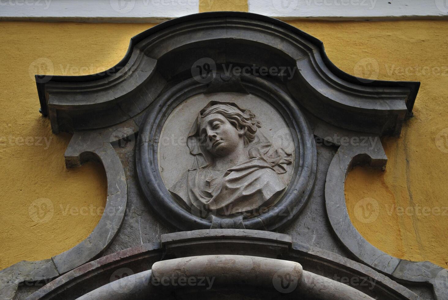 Bust of Mozarts sister Nannal at the entrance of Mozarts birth house, Salzburg, Austria photo