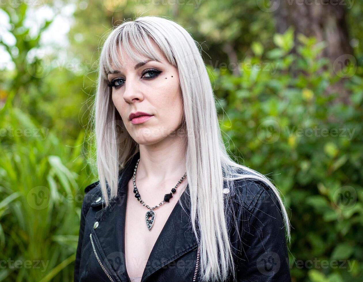 beautiful young goth woman outdoor, photo