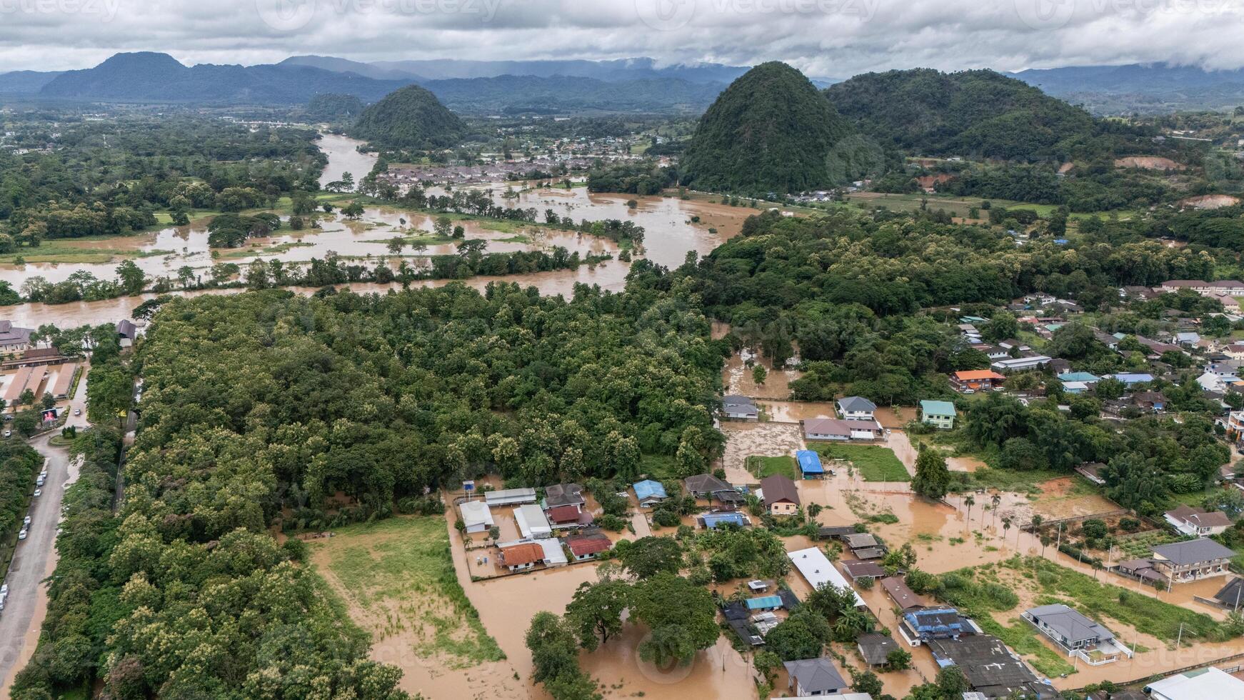Aerial view of suburb area in Chiang Rai province flooded by Kok river after typhoon Yagi has swept Southeast Asia. photo