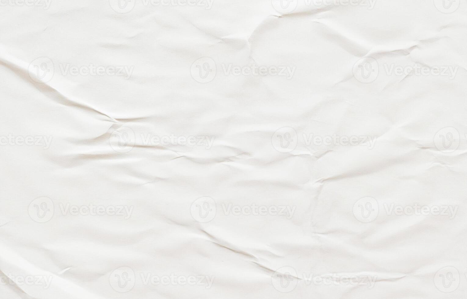 Crumpled white paper texture with soft creases, ideal for design, scrapbooking, or grunge backgrounds. photo