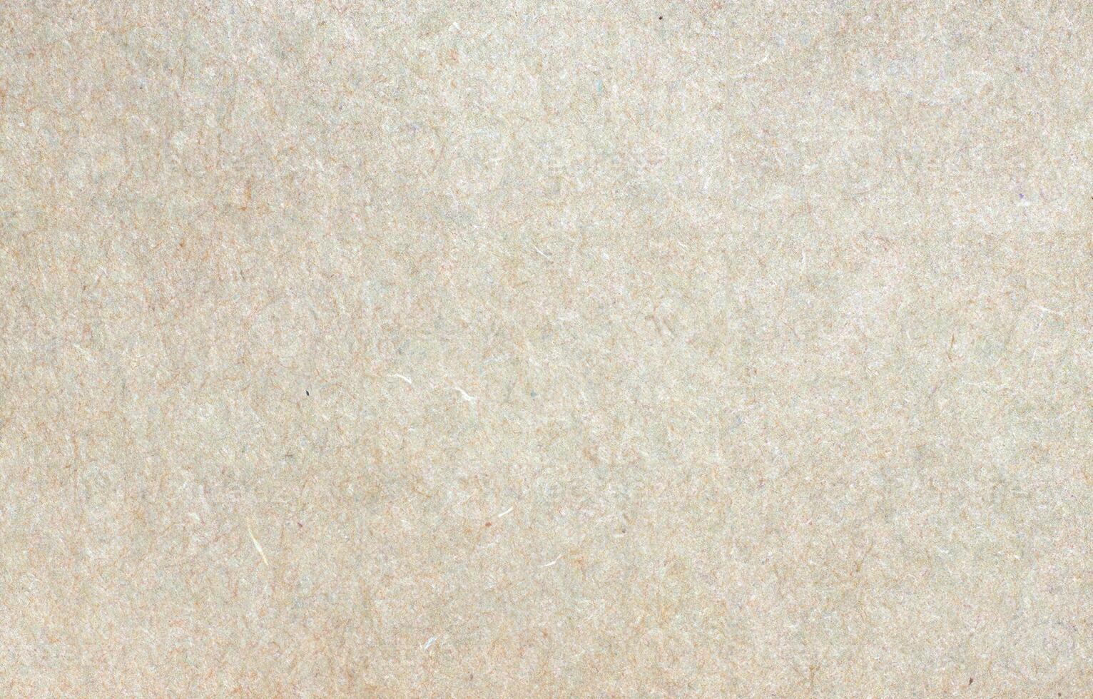 Eco-friendly recycled paper texture with visible fibers and neutral beige tone, ideal for backgrounds photo
