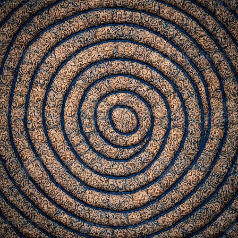 A spiral pattern made of brown and blue fabric photo