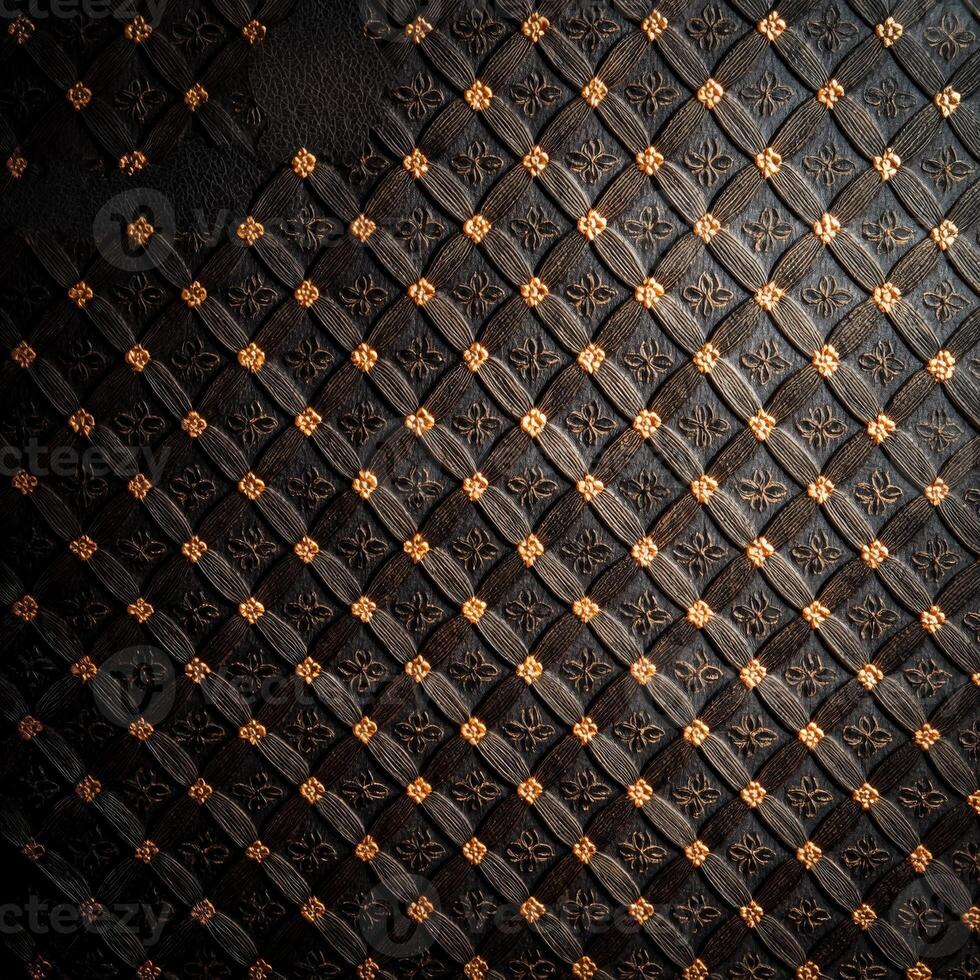 A black and gold patterned wall with a diamond pattern photo