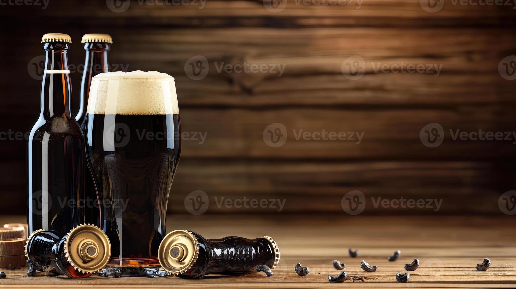 Beer bottles and a glass of dark beer on a wooden table photo
