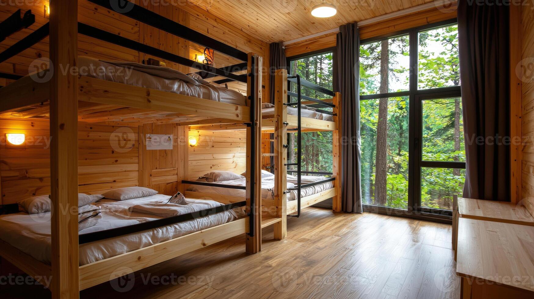 Bunk beds in a cabin with wooden walls and windows photo