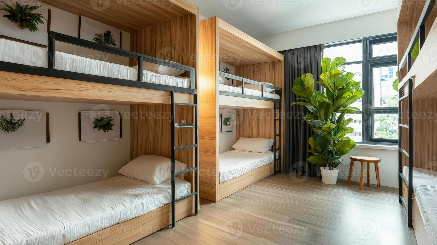 A bunk bed with white sheets and a plant photo