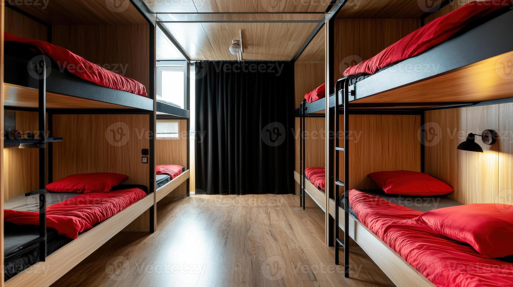A bunk bed with red pillows and black curtains photo